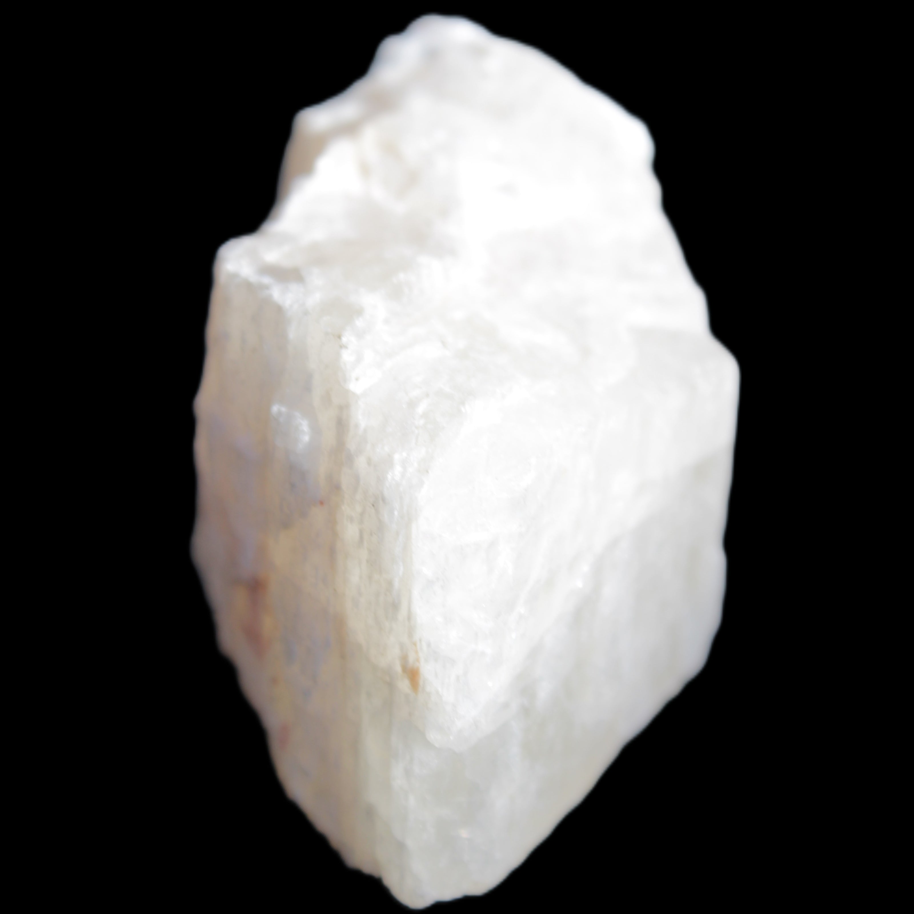Pink Fluorescent White Calcite crystal 42*28*23mm 41g in sunlight - Rocks and Things Store