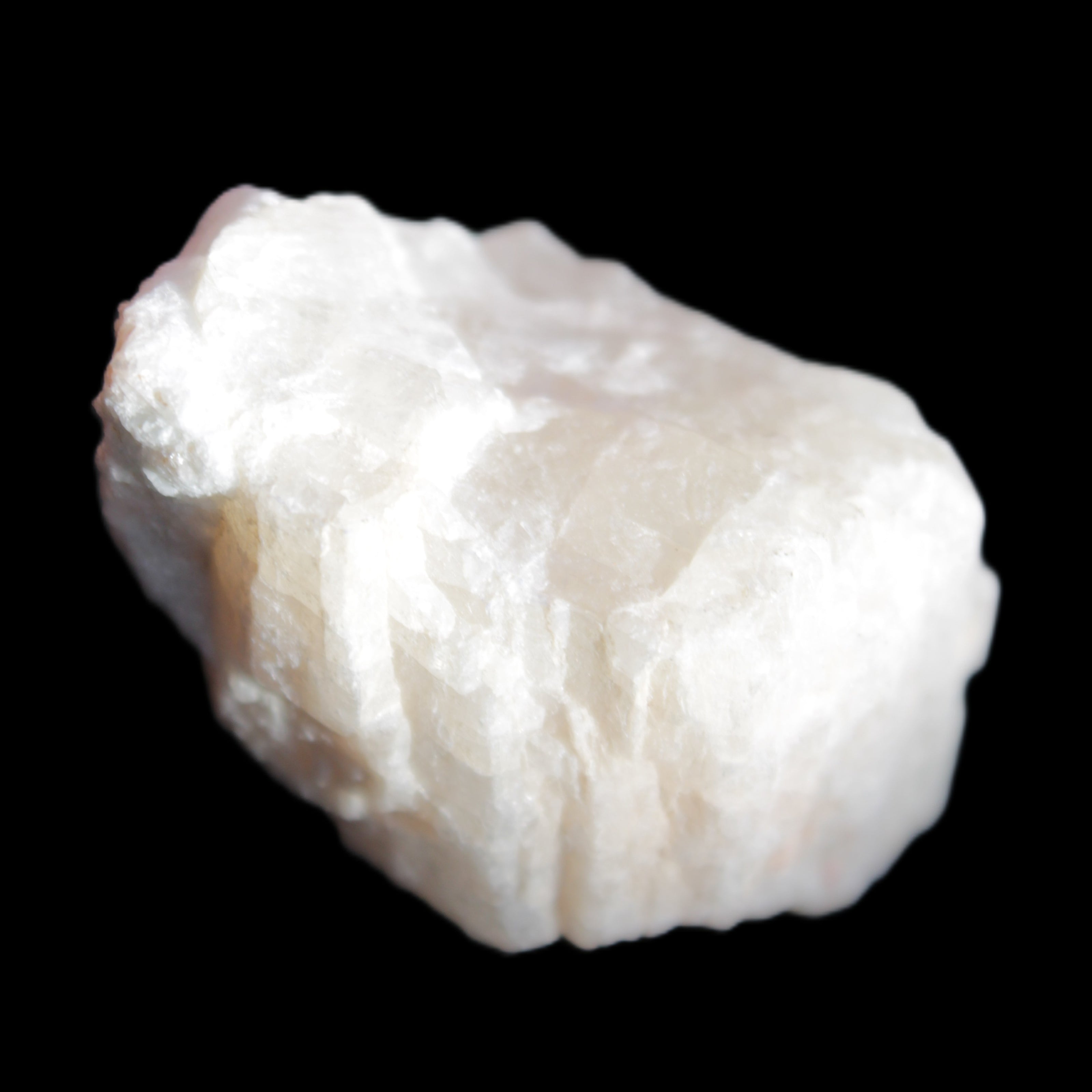 Pink Fluorescent White Calcite crystal 42*28*23mm 41g in sunlight - Rocks and Things Store