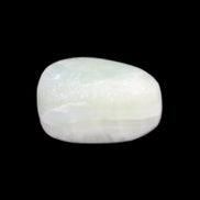 Pistachio Calcite tumbled stone 14-24g in sunlight - Rocks and Things Store