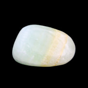 Pistachio Calcite tumbled stone 14-24g in sunlight - Rocks and Things Store