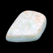 Pistachio Calcite tumbled stone 14-24g in sunlight - Rocks and Things Store