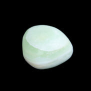 Pistachio Calcite tumbled stone 14-24g in sunlight - Rocks and Things Store