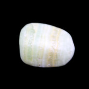 Pistachio Calcite tumbled stone 14-24g in sunlight - Rocks and Things Store