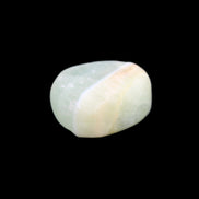 Pistachio Calcite tumbled stone 14-24g in sunlight - Rocks and Things Store