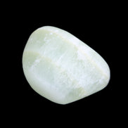Pistachio Calcite tumbled stone 14-24g in sunlight - Rocks and Things Store