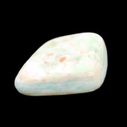 Pistachio Calcite tumbled stone 14-24g in sunlight - Rocks and Things Store