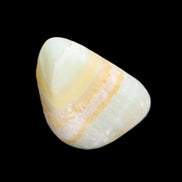 Pistachio Calcite tumbled stone 14-24g in sunlight - Rocks and Things Store