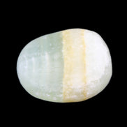 Pistachio Calcite tumbled stone 14-24g in sunlight - Rocks and Things Store