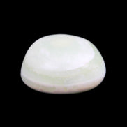 Pistachio Calcite tumbled stone 14-24g in sunlight - Rocks and Things Store