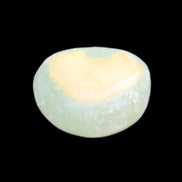 Pistachio Calcite tumbled stone 14-24g in sunlight - Rocks and Things Store