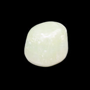 Pistachio Calcite tumbled stone 14-24g in sunlight - Rocks and Things Store