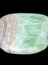 Pistachio Calcite tumbled stone 38*32*14mm 34g in sunlight - Rocks and Things Store