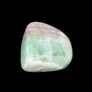 Pistachio Calcite tumbled stone 38*32*14mm 34g in sunlight - Rocks and Things Store