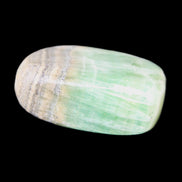 Pistachio Calcite tumbled stone 38*32*14mm 34g in sunlight - Rocks and Things Store