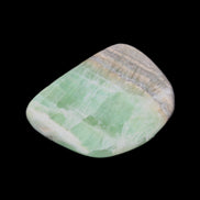 Pistachio Calcite tumbled stone 38*32*14mm 34g in sunlight - Rocks and Things Store