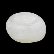 Pistachio Calcite tumbled stone 20-28mm 11-19g in sunlight - Rocks and Things Store