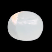 Pistachio Calcite tumbled stone 20-28mm 11-19g in sunlight - Rocks and Things Store