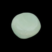Pistachio Calcite tumbled stone 20-28mm 11-19g in sunlight - Rocks and Things Store