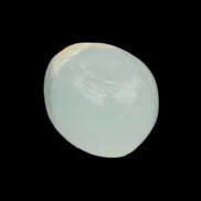 Pistachio Calcite tumbled stone 20-28mm 11-19g in sunlight - Rocks and Things Store