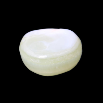 Pistachio Calcite tumbled stone 20-28mm 11-19g in sunlight - Rocks and Things Store