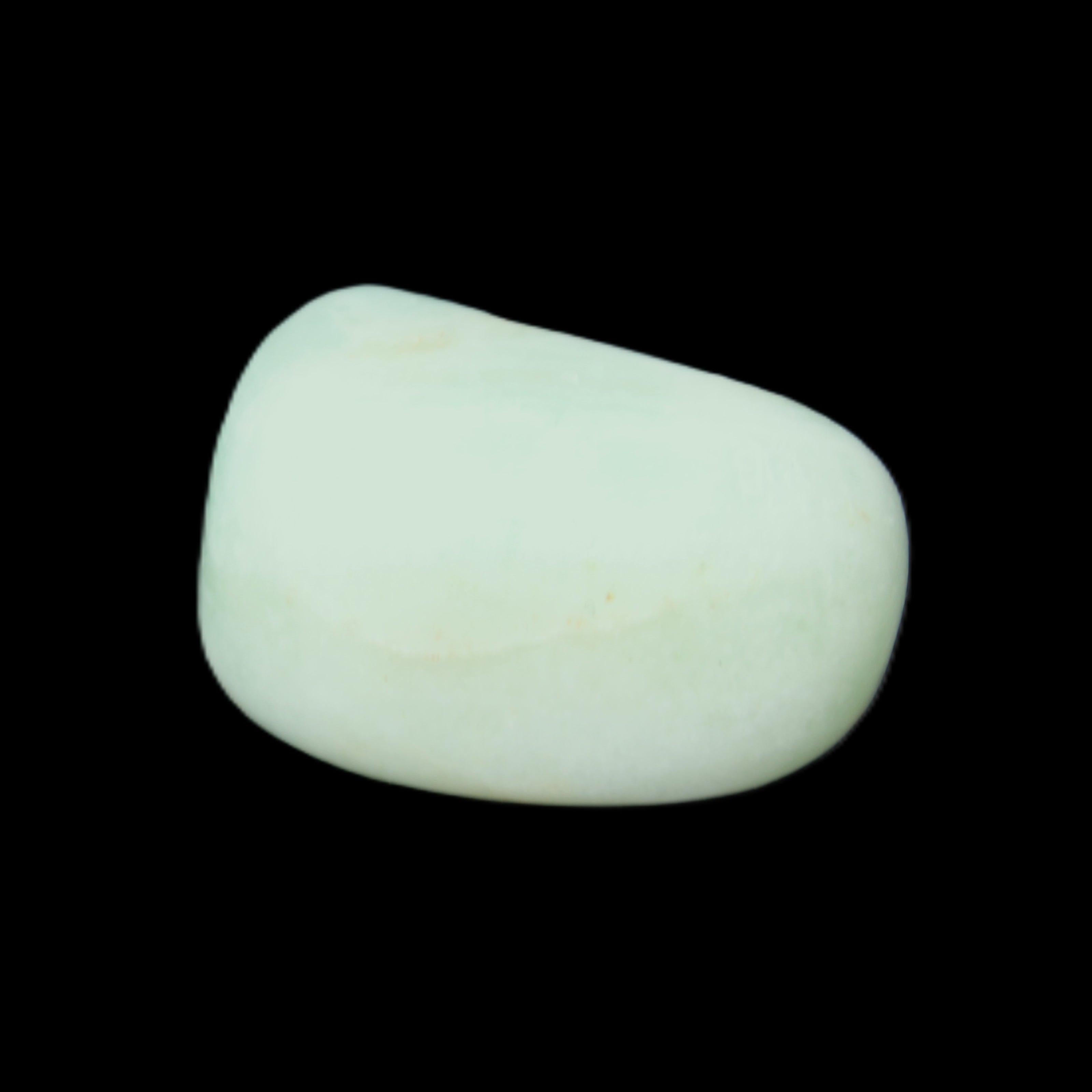 Pistachio Calcite tumbled stone 20-28mm 11-19g in sunlight - Rocks and Things Store