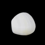 Pistachio Calcite tumbled stone 20-28mm 11-19g in sunlight - Rocks and Things Store