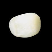 Pistachio Calcite tumbled stone 20-28mm 11-19g in sunlight - Rocks and Things Store
