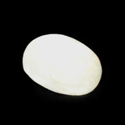 Pistachio Calcite tumbled stone 20-28mm 11-19g in sunlight - Rocks and Things Store