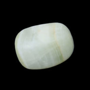 Pistachio Calcite tumbled stone 25-40mm 20-30g in sunlight - Rocks and Things Store