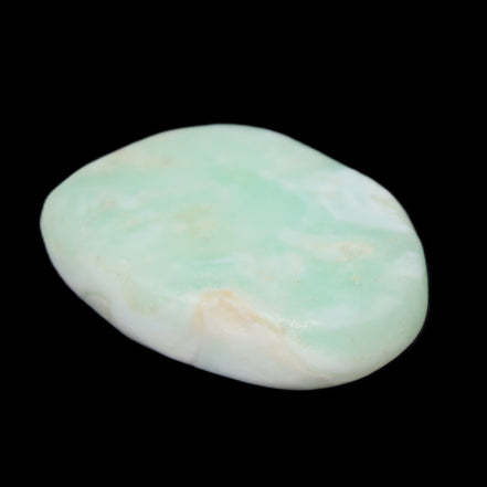 Pistachio Calcite tumbled stone 25-40mm 20-30g in sunlight - Rocks and Things Store