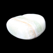 Pistachio Calcite tumbled stone 25-40mm 20-30g in sunlight - Rocks and Things Store