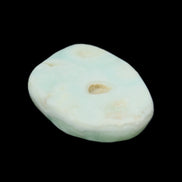 Pistachio Calcite tumbled stone 25-40mm 20-30g in sunlight - Rocks and Things Store