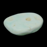 Pistachio Calcite tumbled stone 25-40mm 20-30g in sunlight - Rocks and Things Store