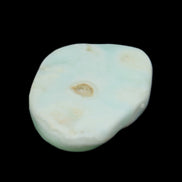 Pistachio Calcite tumbled stone 25-40mm 20-30g in sunlight - Rocks and Things Store