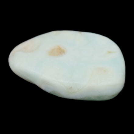 Pistachio Calcite tumbled stone 25-40mm 20-30g in sunlight - Rocks and Things Store