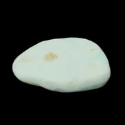 Pistachio Calcite tumbled stone 25-40mm 20-30g in sunlight - Rocks and Things Store