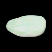 Pistachio Calcite tumbled stone 25-40mm 20-30g in sunlight - Rocks and Things Store