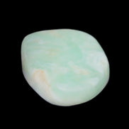 Pistachio Calcite tumbled stone 25-40mm 20-30g in sunlight - Rocks and Things Store