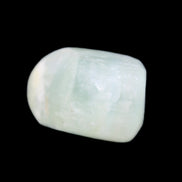 Pistachio Calcite tumbled stone 15-26mm 10-15g in sunlight - Rocks and Things Store
