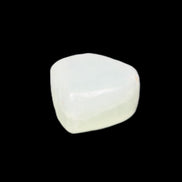 Pistachio Calcite tumbled stone 15-26mm 10-15g in sunlight - Rocks and Things Store