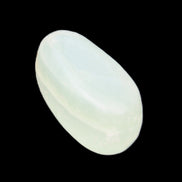 Pistachio Calcite tumbled stone 15-26mm 10-15g in sunlight - Rocks and Things Store