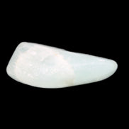 Pistachio Calcite tumbled stone 15-26mm 10-15g in sunlight - Rocks and Things Store