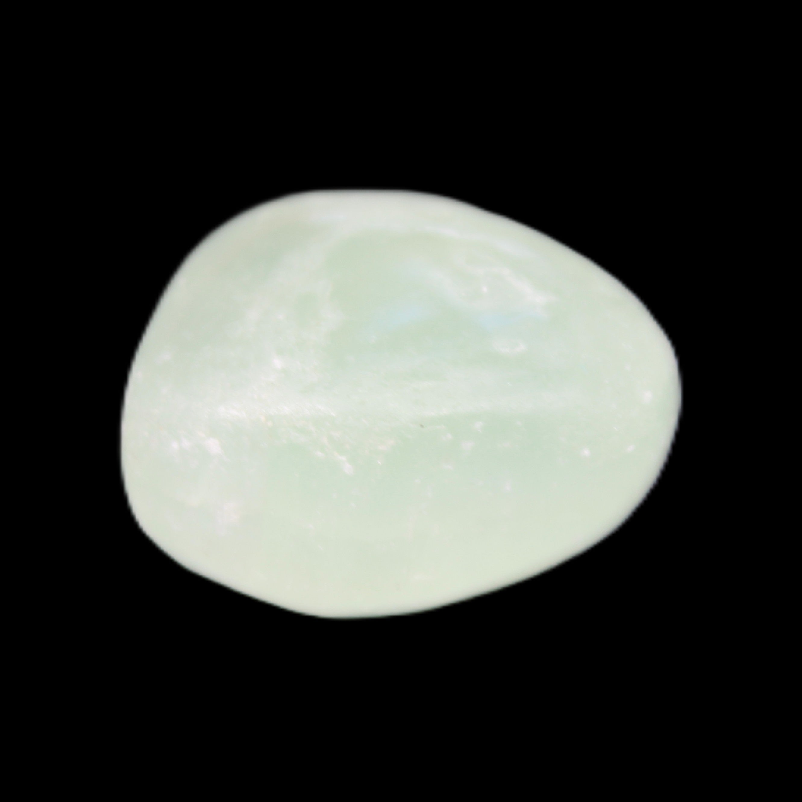 Pistachio Calcite tumbled stone 15-26mm 10-15g in sunlight - Rocks and Things Store