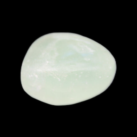 Pistachio Calcite tumbled stone 15-26mm 10-15g in sunlight - Rocks and Things Store