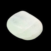 Pistachio Calcite tumbled stone 15-26mm 10-15g in sunlight - Rocks and Things Store