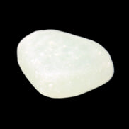 Pistachio Calcite tumbled stone 15-26mm 10-15g in sunlight - Rocks and Things Store