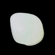 Pistachio Calcite tumbled stone 15-26mm 10-15g in sunlight - Rocks and Things Store