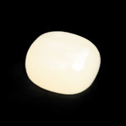 Honey Calcite tumbled stone 18-21mm 8-14g in sunlight - Rocks and Things Store