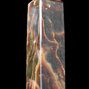 Chocolate Calcite obelisk 120*33*32mm 332g in sunlight - Rocks and Things Store