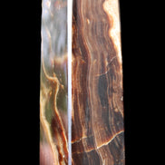 Chocolate Calcite obelisk 120*33*32mm 332g in sunlight - Rocks and Things Store